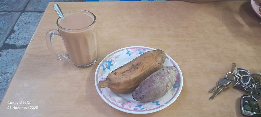 A plate of food and a glass of chocolate milk

AI-generated content may be incorrect.